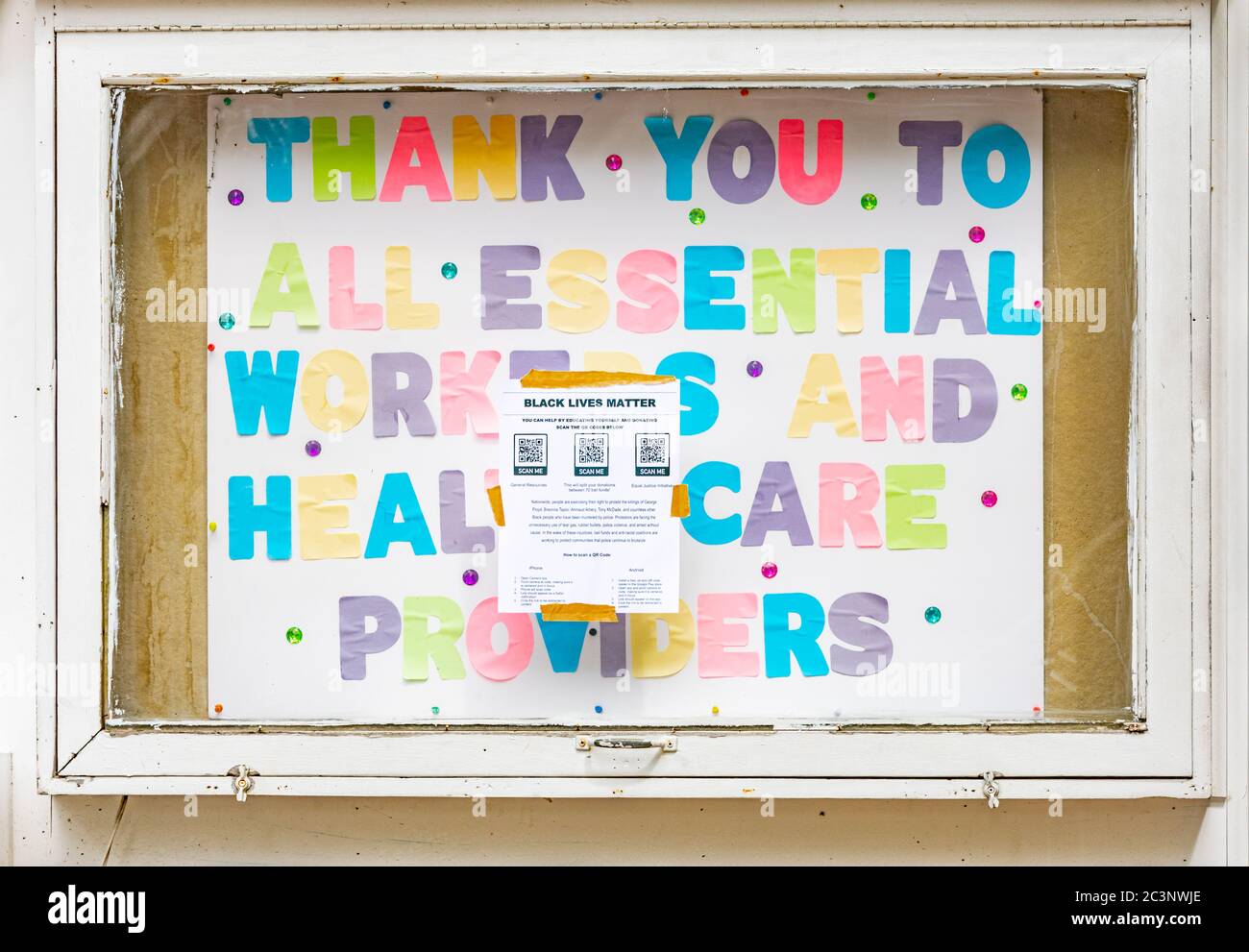 Hand made sign thanking all essential workers and health care providers Stock Photo