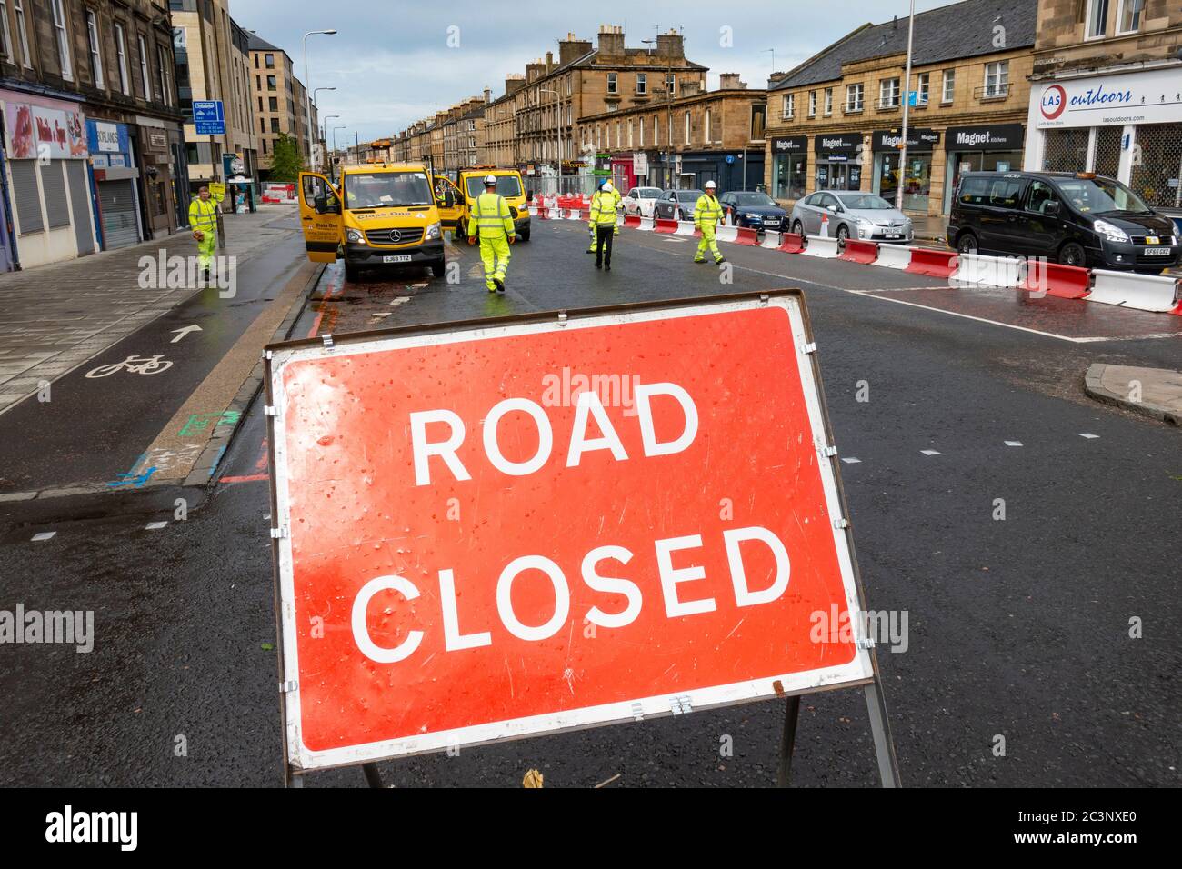 Edinburgh, Scotland, UK. 21 June, 2020. Traffic management work and lane closures on Leith Walk signals the start of construction work for the new Edinburgh tram line extension to Newhaven. Disruption to traffic and businesses on Leith Walk is expected to last for over a year. Iain Masterton/Alamy Live News Stock Photo