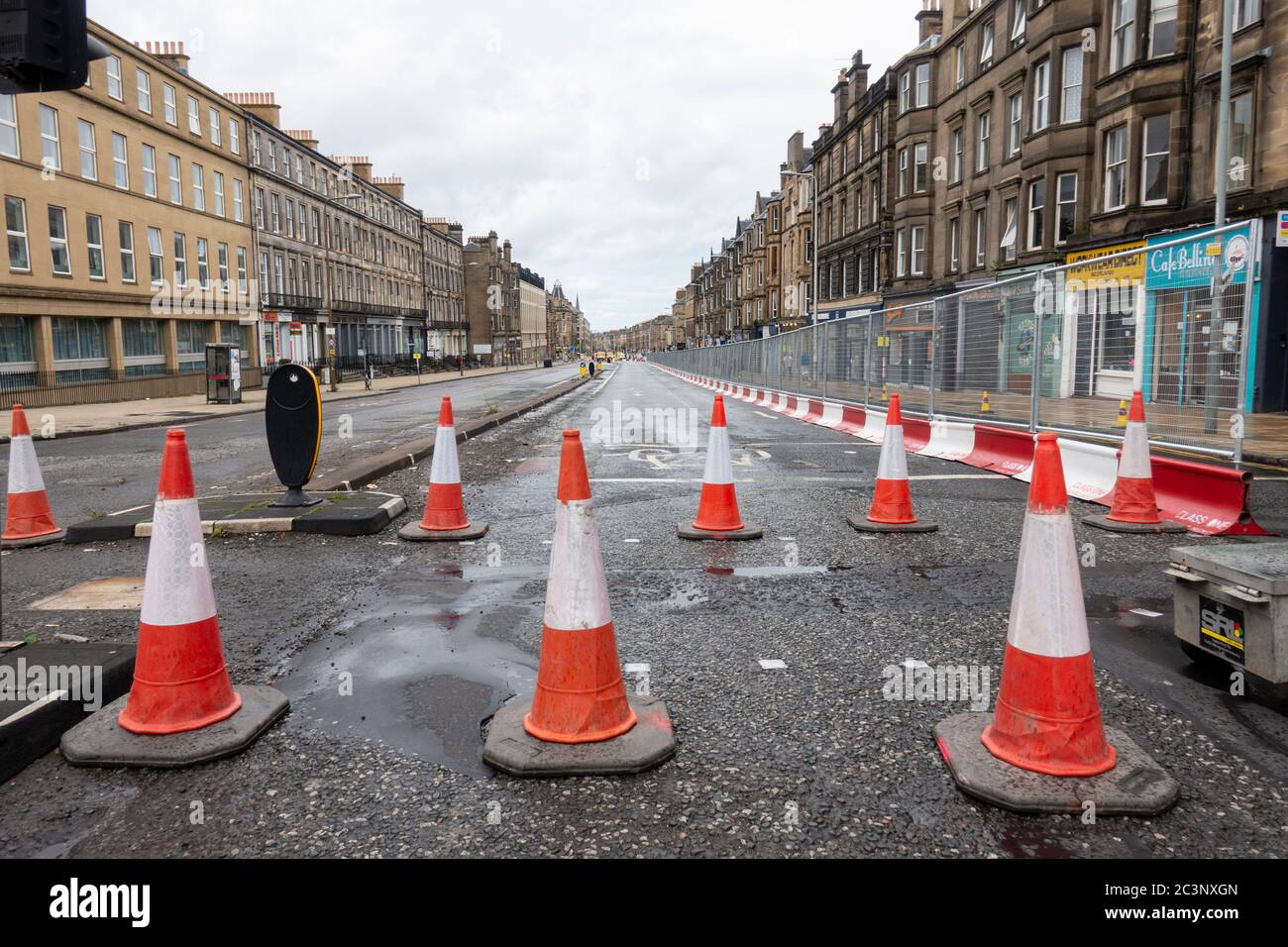 Edinburgh, Scotland, UK. 21 June, 2020. Traffic management work and lane closures on Leith Walk signals the start of construction work for the new Edinburgh tram line extension to Newhaven. Disruption to traffic and businesses on Leith Walk is expected to last for over a year. Iain Masterton/Alamy Live News Stock Photo