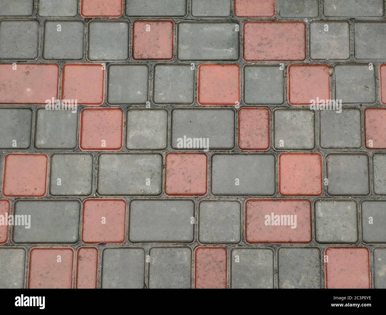 Texture of wet paving slabs with spots and reflections Stock Photo