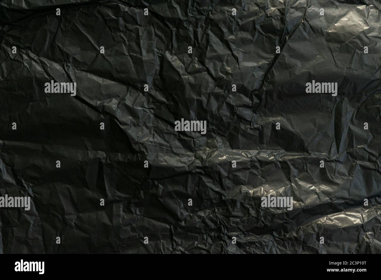 black crumpled paper. abstract background. black background Stock Photo