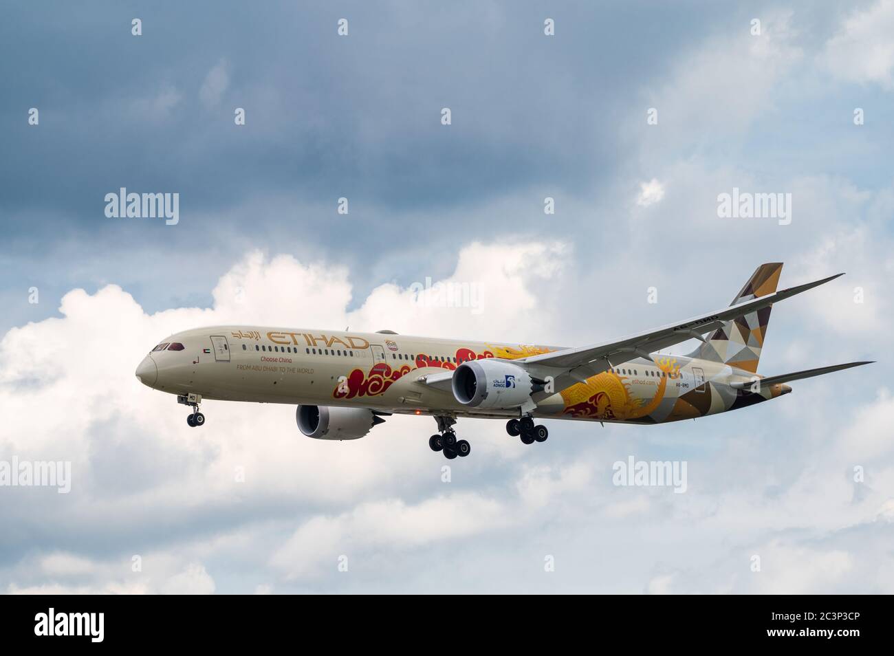 Etihad Airways Boeing 787-10 A6-0BMC aircraft with Chinese dragon scheme approaching to land at Frankfurt Airport in Germany Stock Photo