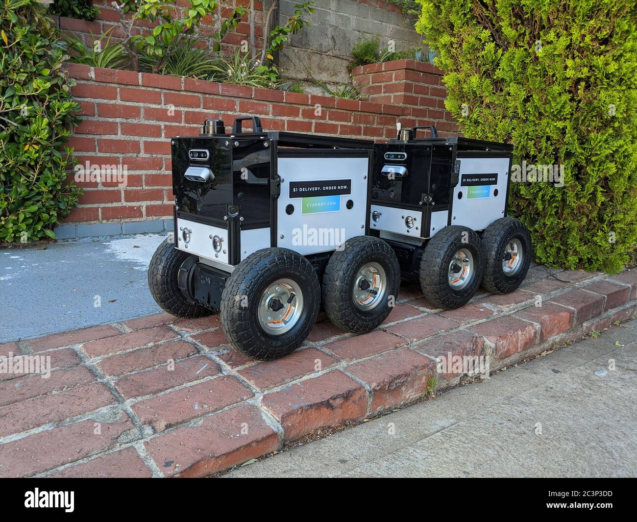 Close up Automated delivery with food delivery robots on the streets of