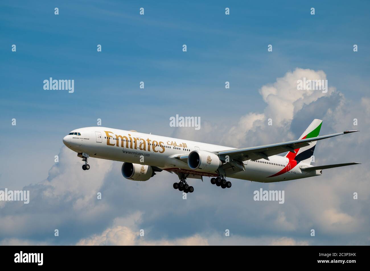 Emirates Airline Boeing 777-300ER wide body aircraft A6-EQL on approach to land at EDDF Frankfurt airport in Germany Stock Photo