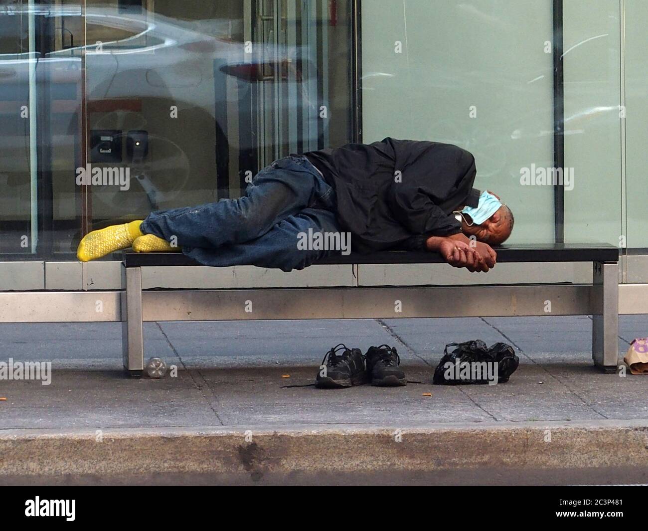 Homeless Sleeping Bus Stop High Resolution Stock Photography And Images Alamy