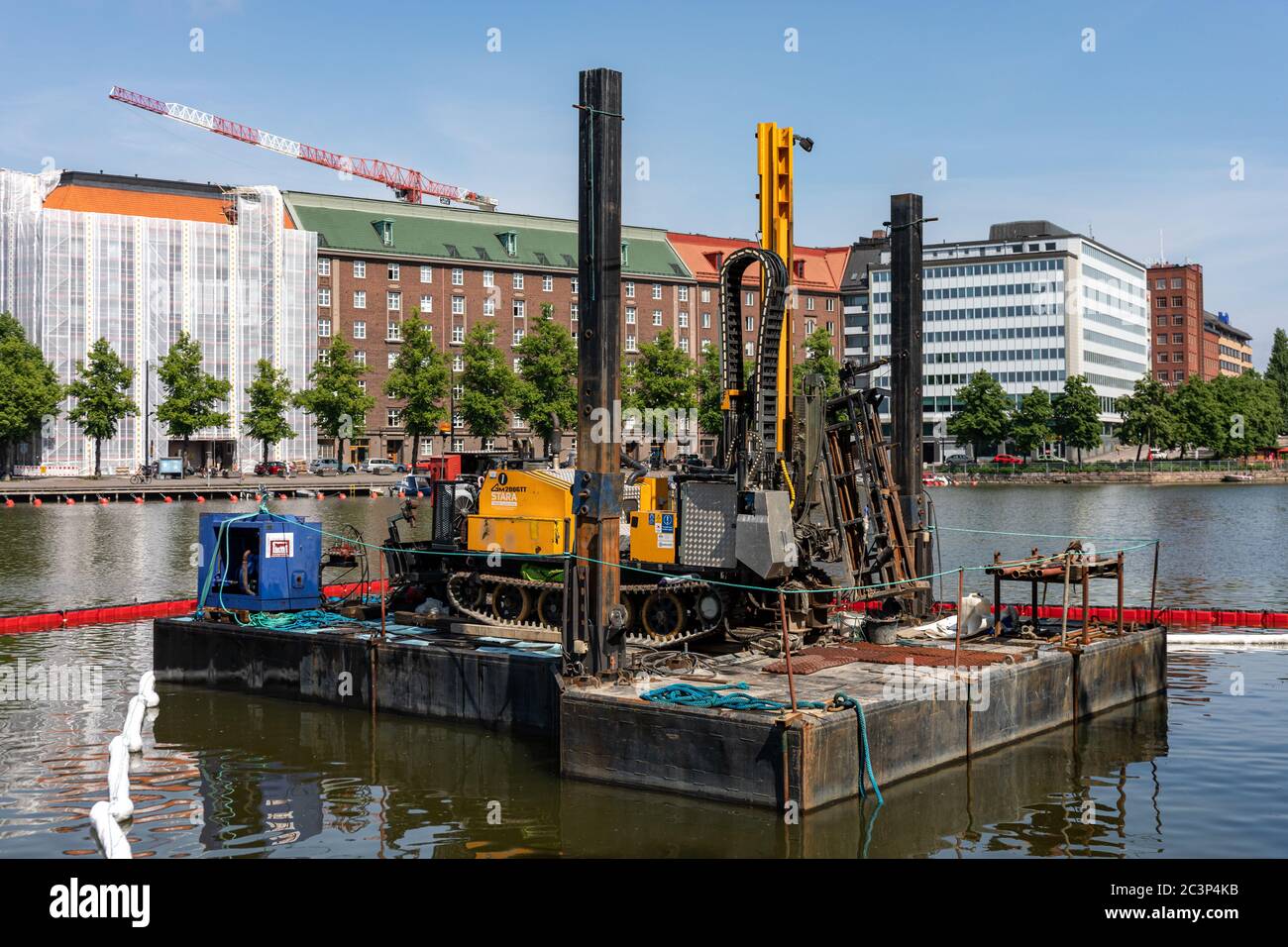 Pile driving barge in Kaisaniemi bay, Helsinki, Finland Stock Photo