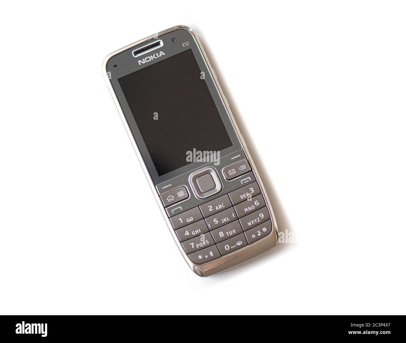 BERLIN - JUN 21: NOKIA E52, old used plastic mobile phone isolated on white background in Berlin on June 21. 2020 in Germany Stock Photo