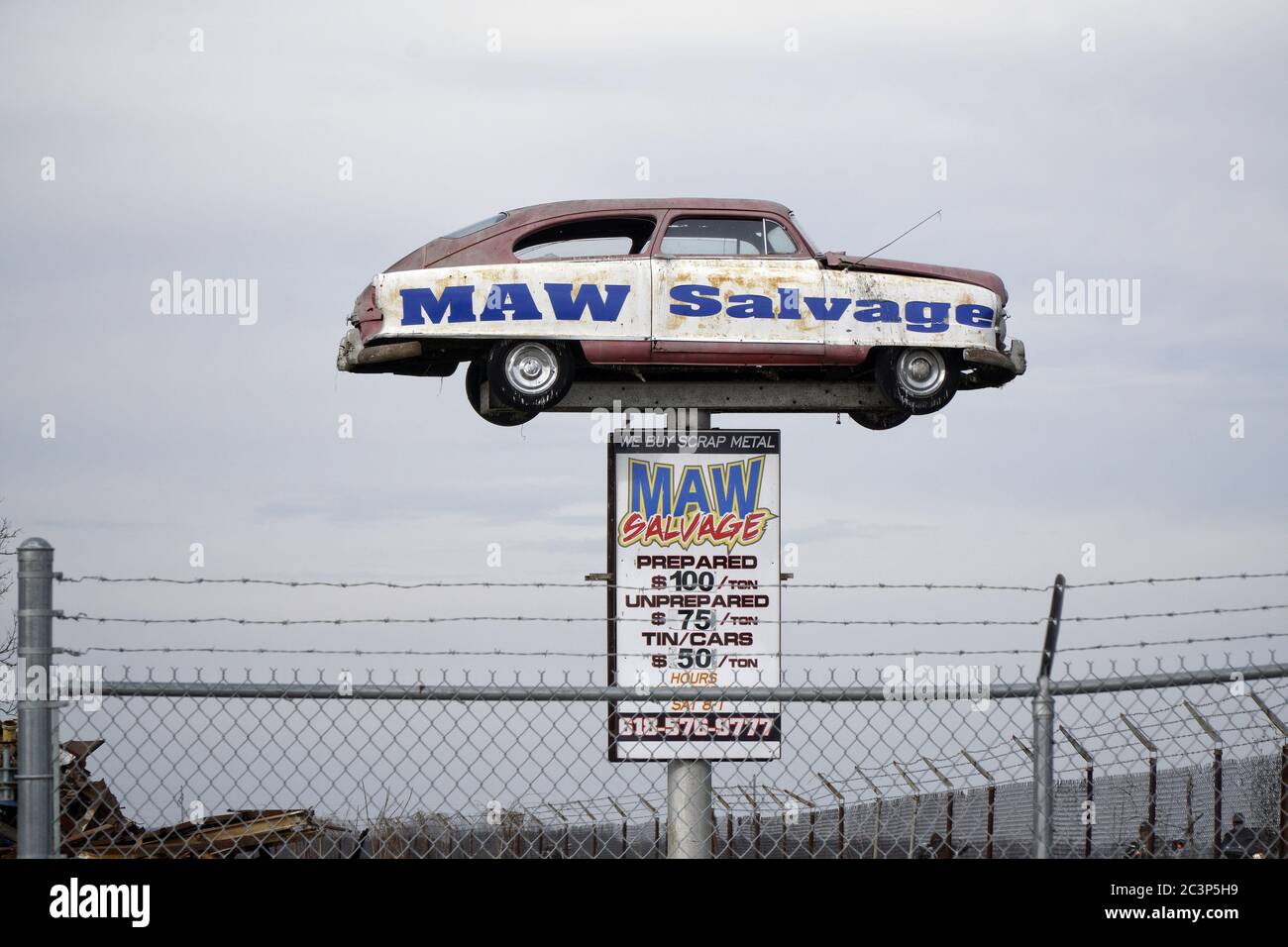 BRIGHTON, UNITED STATES Oct 20, 2013 photo of old car used as a sign
