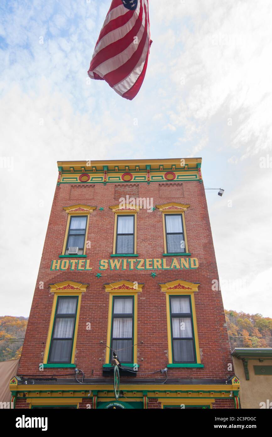 Jim Thorpe USA- October 21 2014; Tall narrow structure of red brick Hotel  Switzerland building displaying its balanced architectural features from  low Stock Photo - Alamy