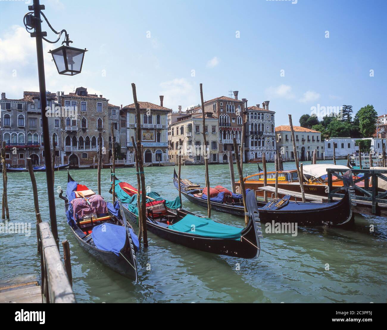 Gondolas moored on Grand Canal, Venice (Venezia), Veneto Region, Italy Stock Photo