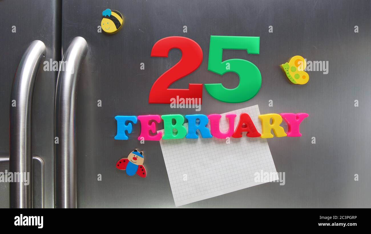 February 25 calendar date made with plastic magnetic letters holding a ...