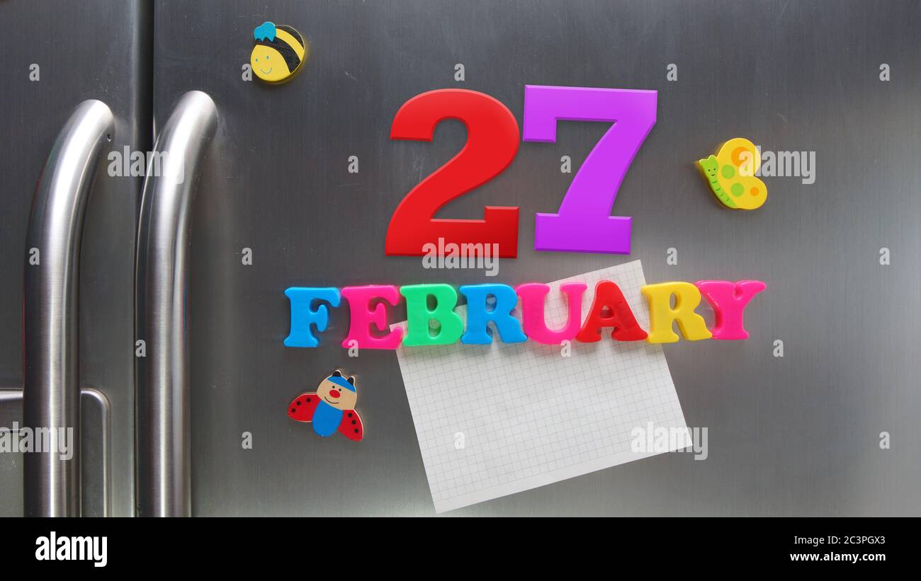 February 27 calendar date made with plastic magnetic letters holding a February 27 calendar date made with plastic magnetic letters holding a