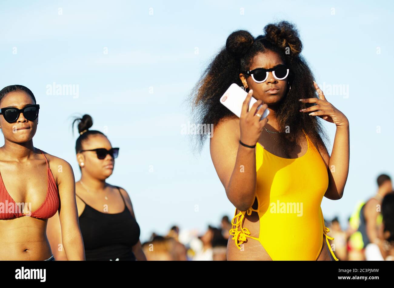 MIAMI - MARCH 16, 2019: Young people flock to South Beach to celebrate Spring Break. Stock Photo