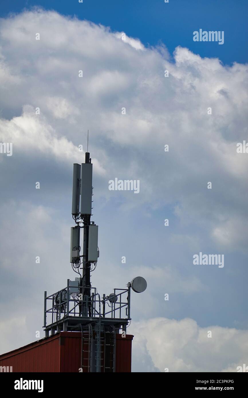 Close up mobile mast – cell site – cell tower – cellular base station Stock Photo