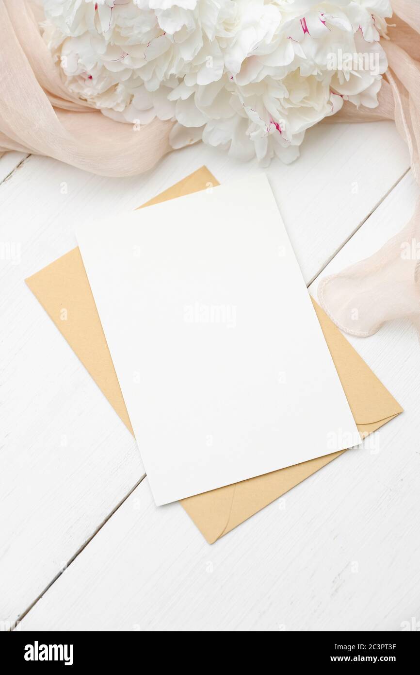 Download Wedding Invitation Card Mockup With Peonies And Fabric On White Wooden Table Blank Paper Note And Envelope Top View Stock Photo Alamy PSD Mockup Templates