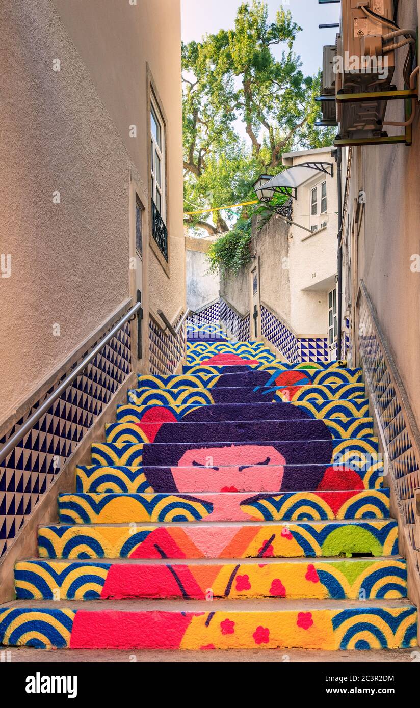 Agueda, Portugal - July 19, 2019: Águeda street art. Staircase with mural painting of a geisha, in Águeda, Portugal. Stock Photo
