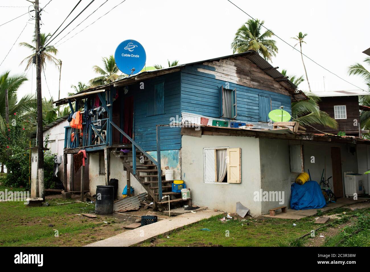 A Caribbean, wooden house with corrugated tin roofing. Isla Bastimentos, Bocas del Toro Province, Panama, Central America Stock Photo