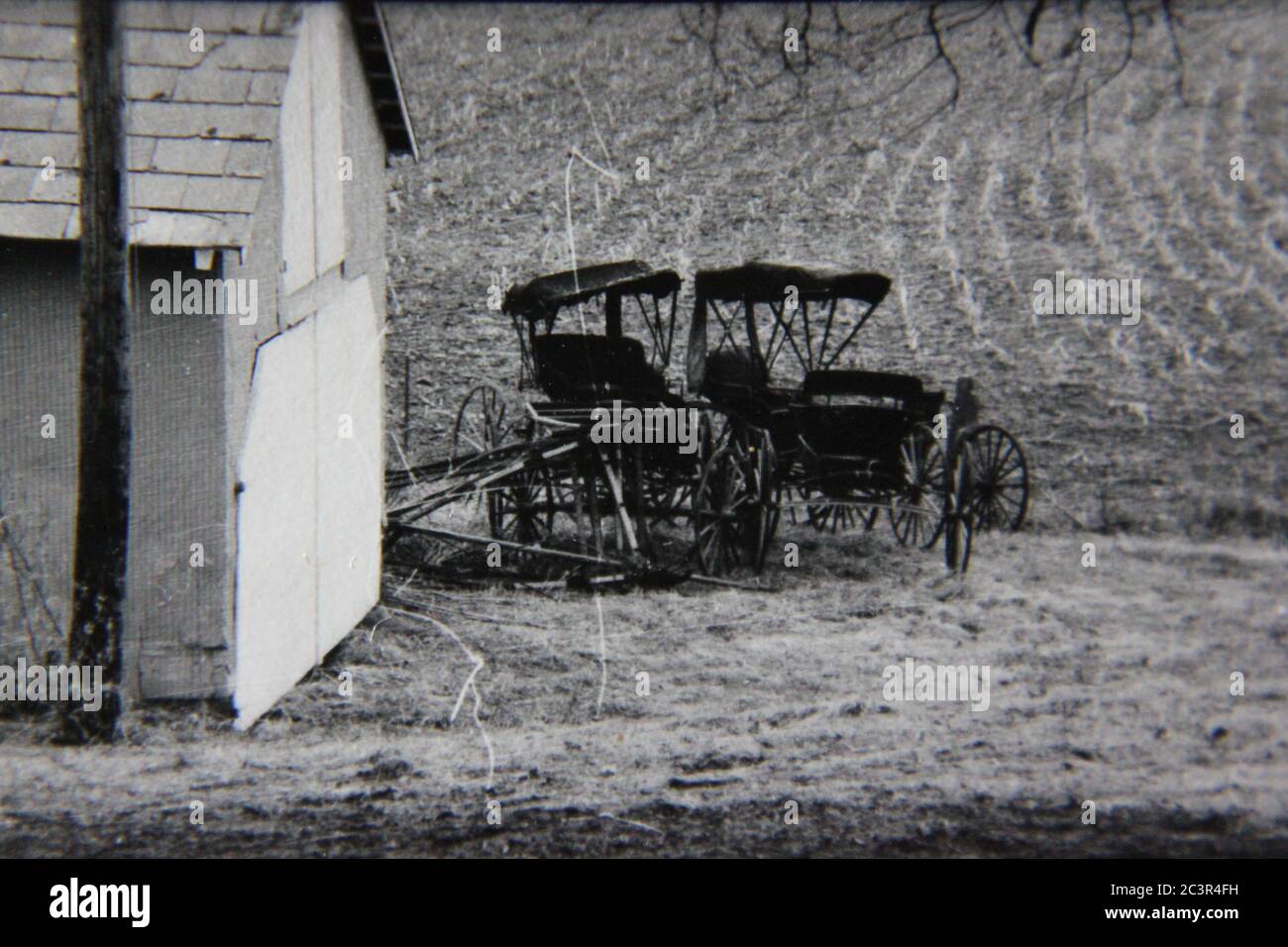 Fine 70s vintage black and white photography of two Amish buggies