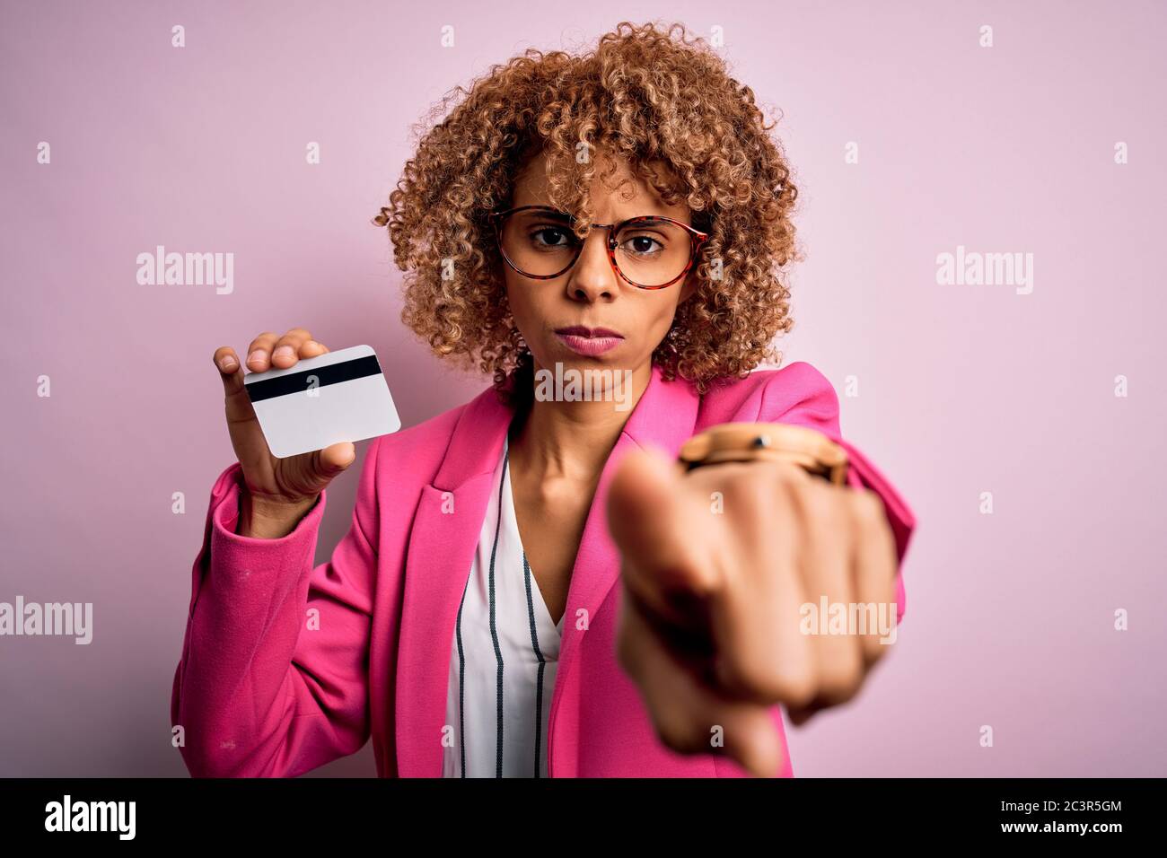 Young african american business woman holding id card identification