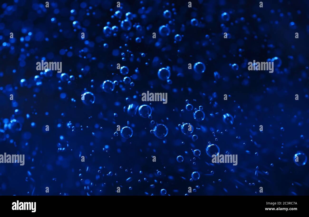 Background of the bubble in dark blue water Stock Photo - Alamy