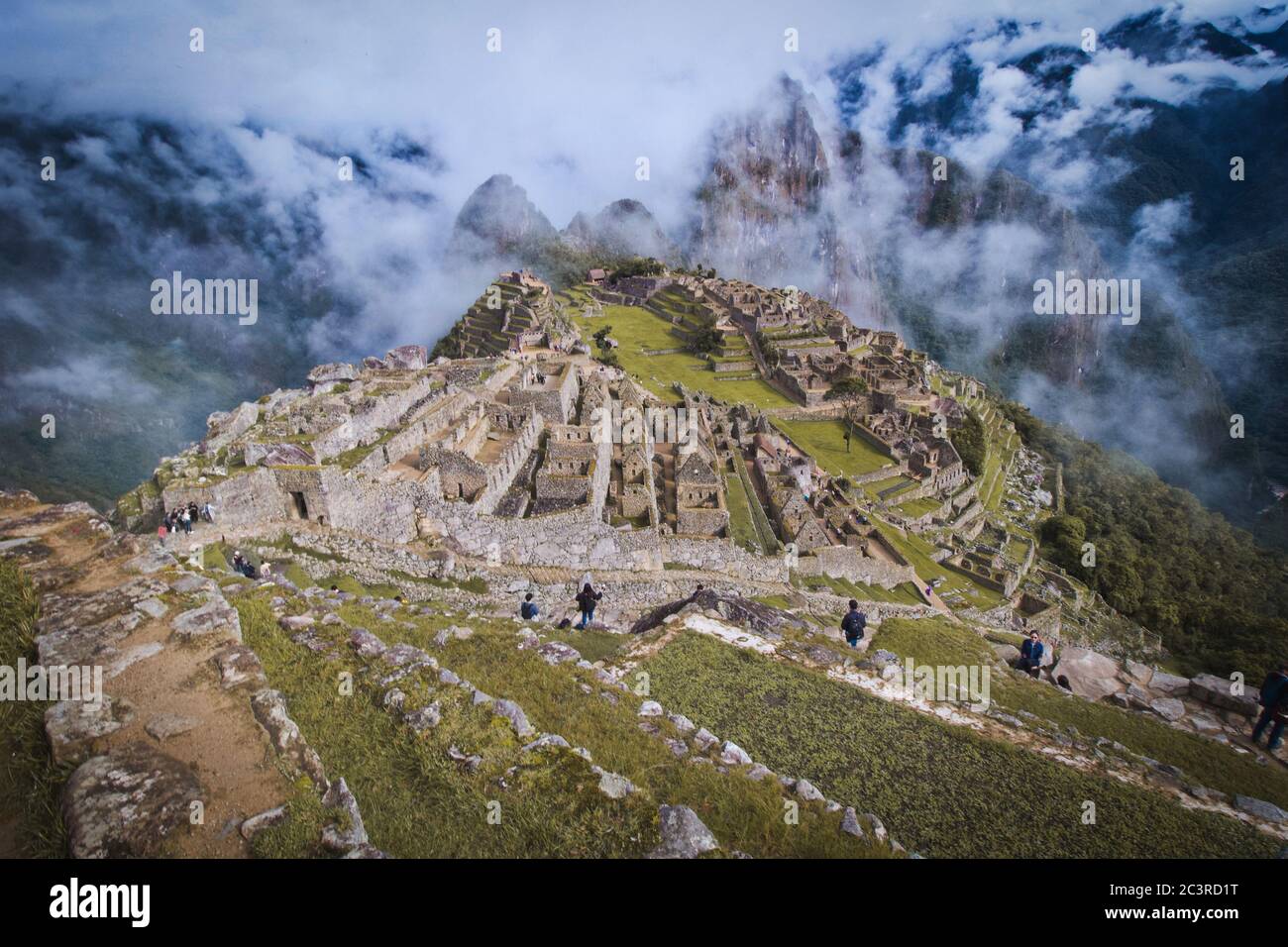 Mountain Machu Picchu Aguas Peru with a group of tourists Stock Photo ...