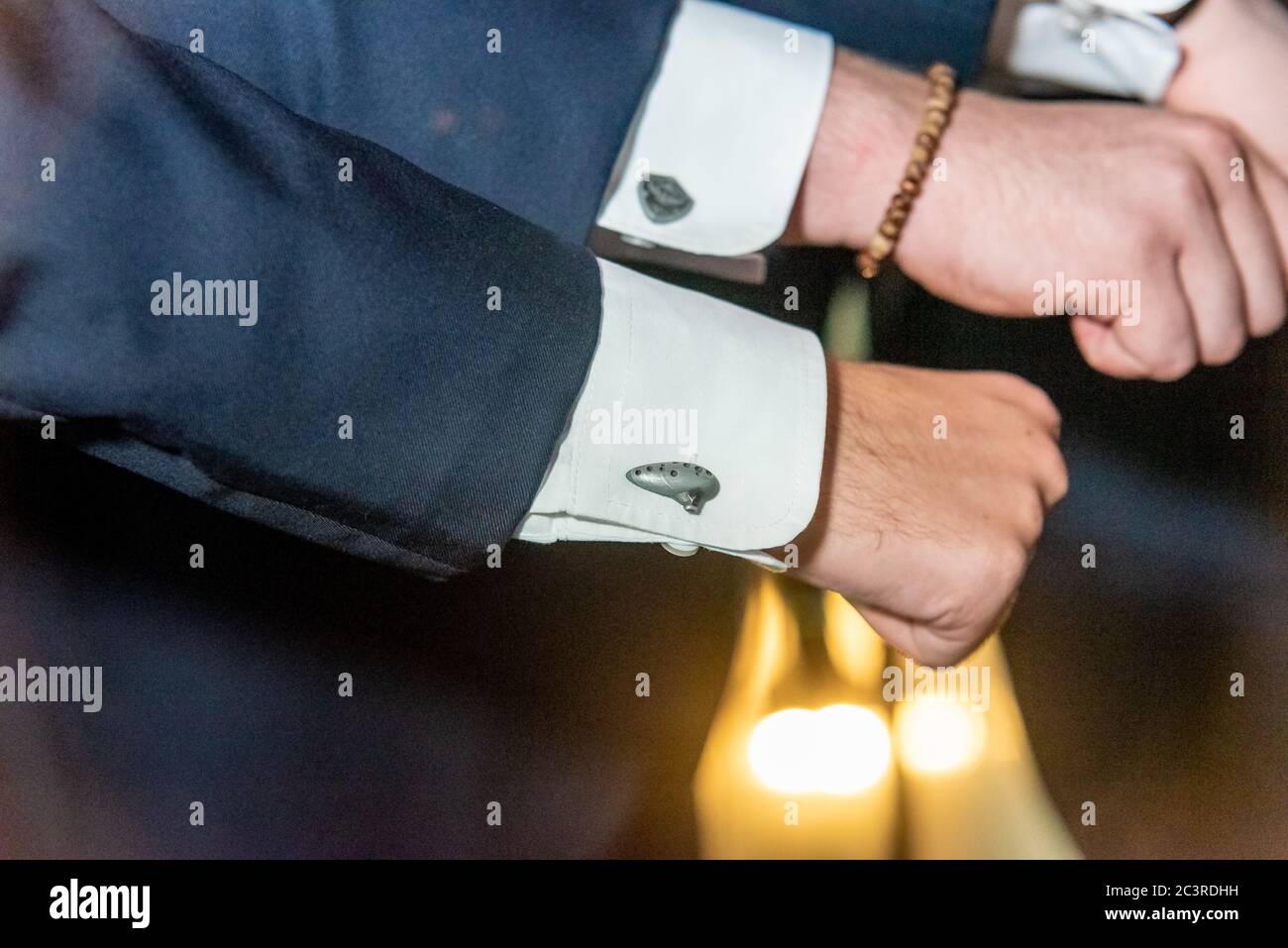 Men wearing black suits hi-res stock photography and images - Alamy