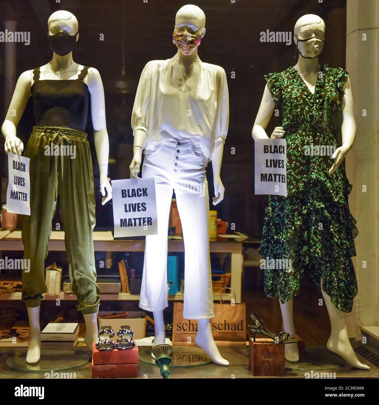 Ottawa, Canada Masked mannequins in window of the Schad women’s