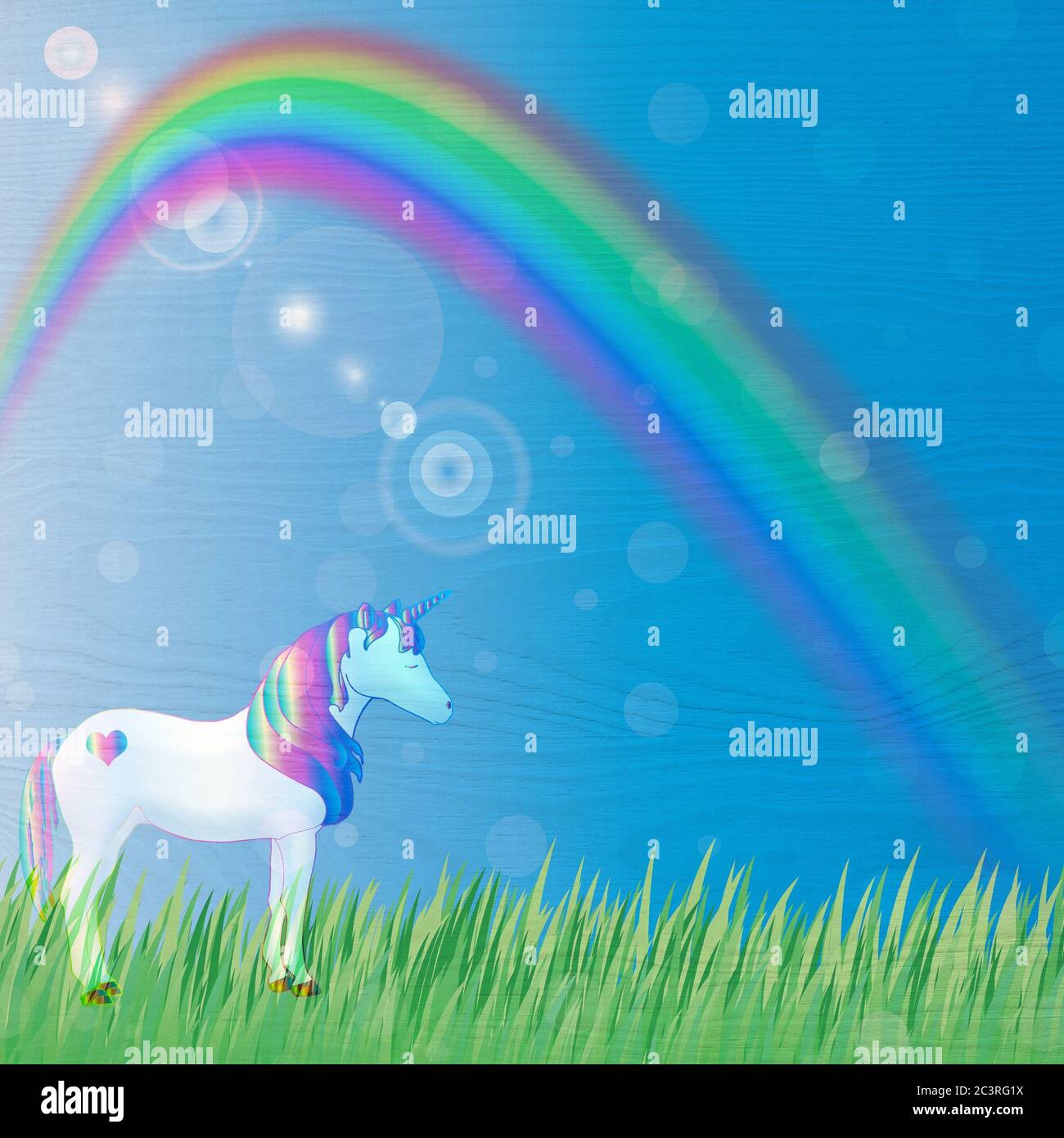 A unicorn on the lawn and a rainbow on a blue background - perfect for ...
