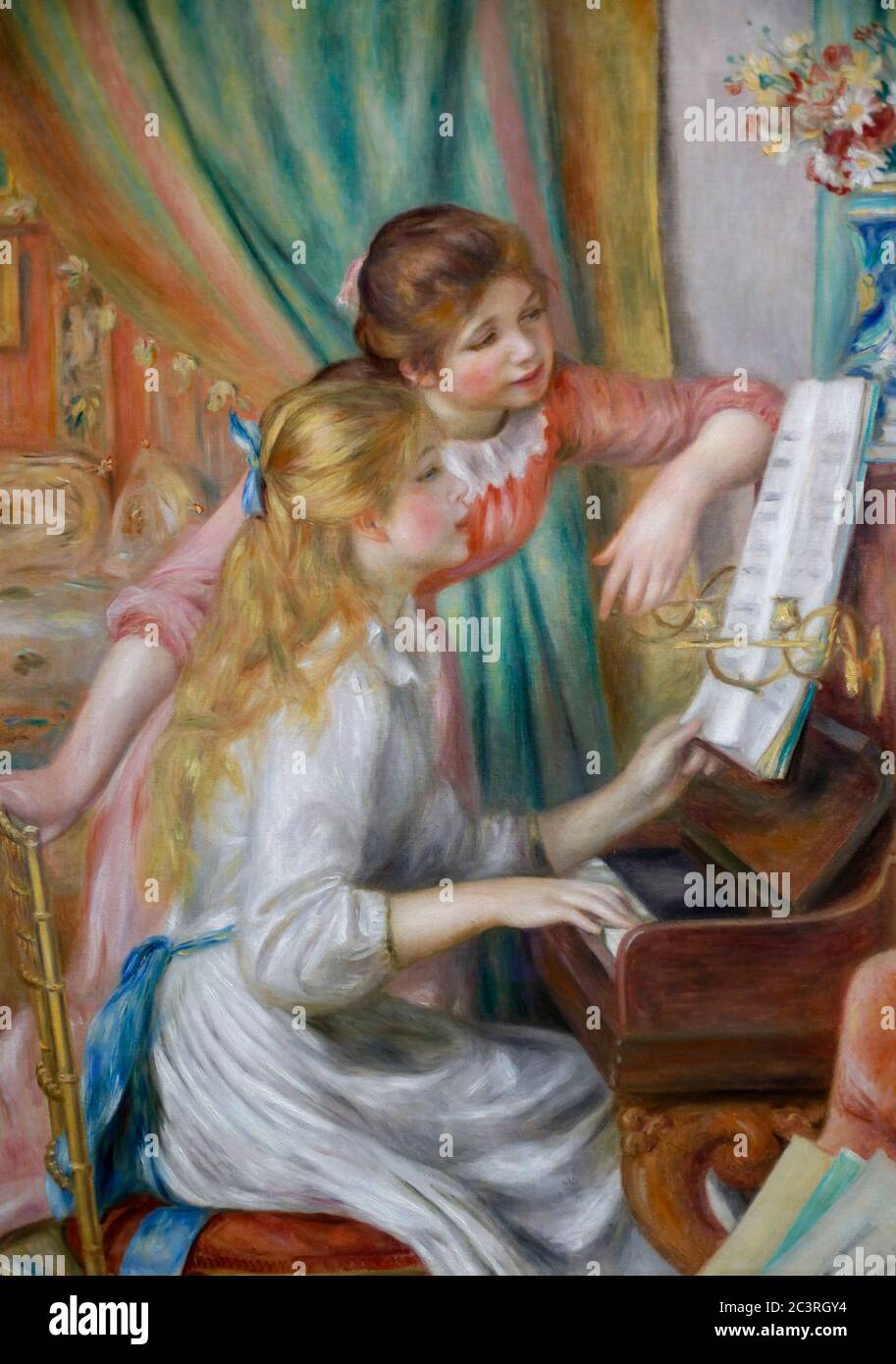 Pierre-Auguste Renoir - Young Girls at the Piano Musèe d'Orsay, Paris, France Stock Photo