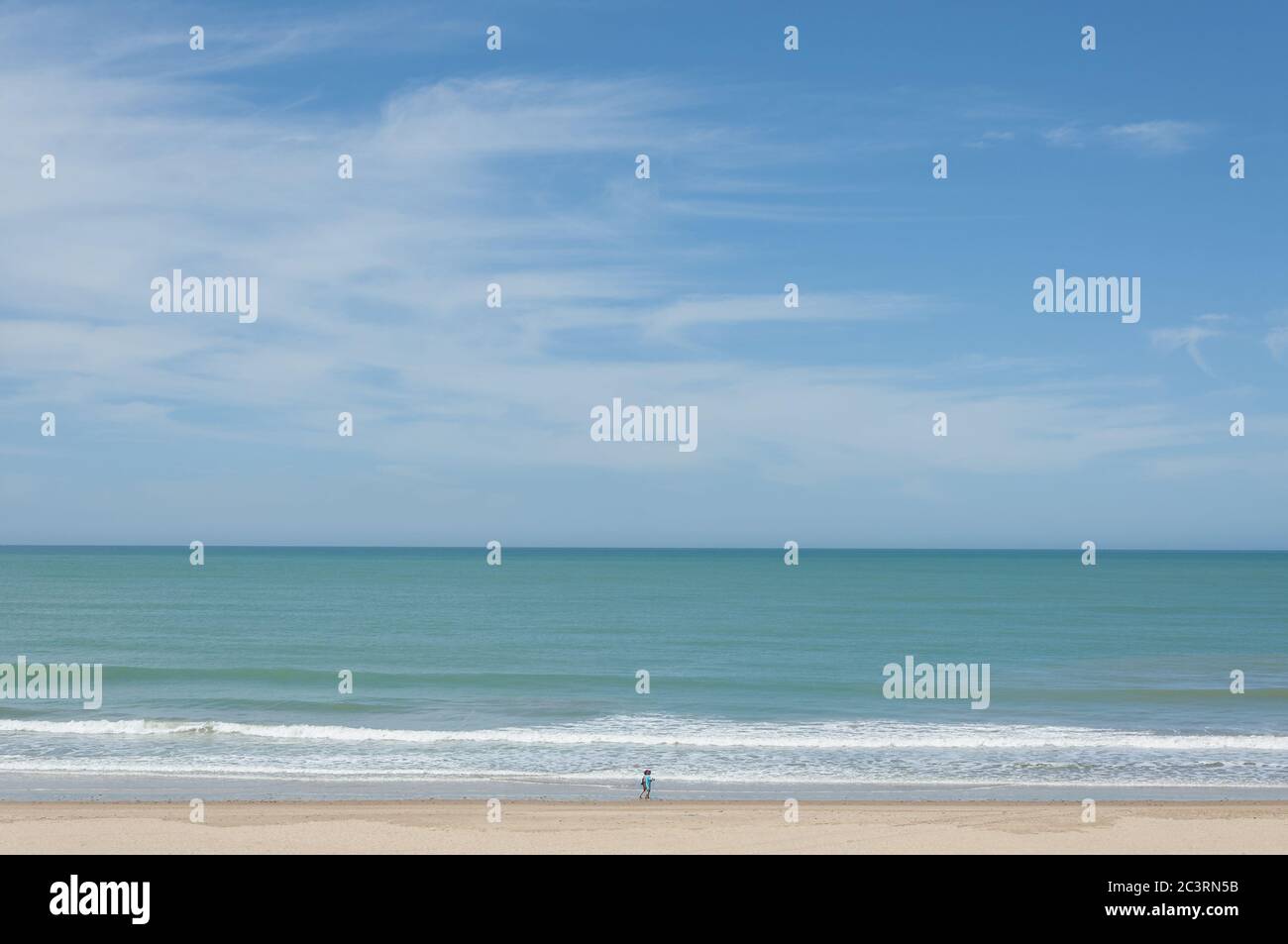Amazing view of a sandy beach on a cloudy sky background Stock Photo ...