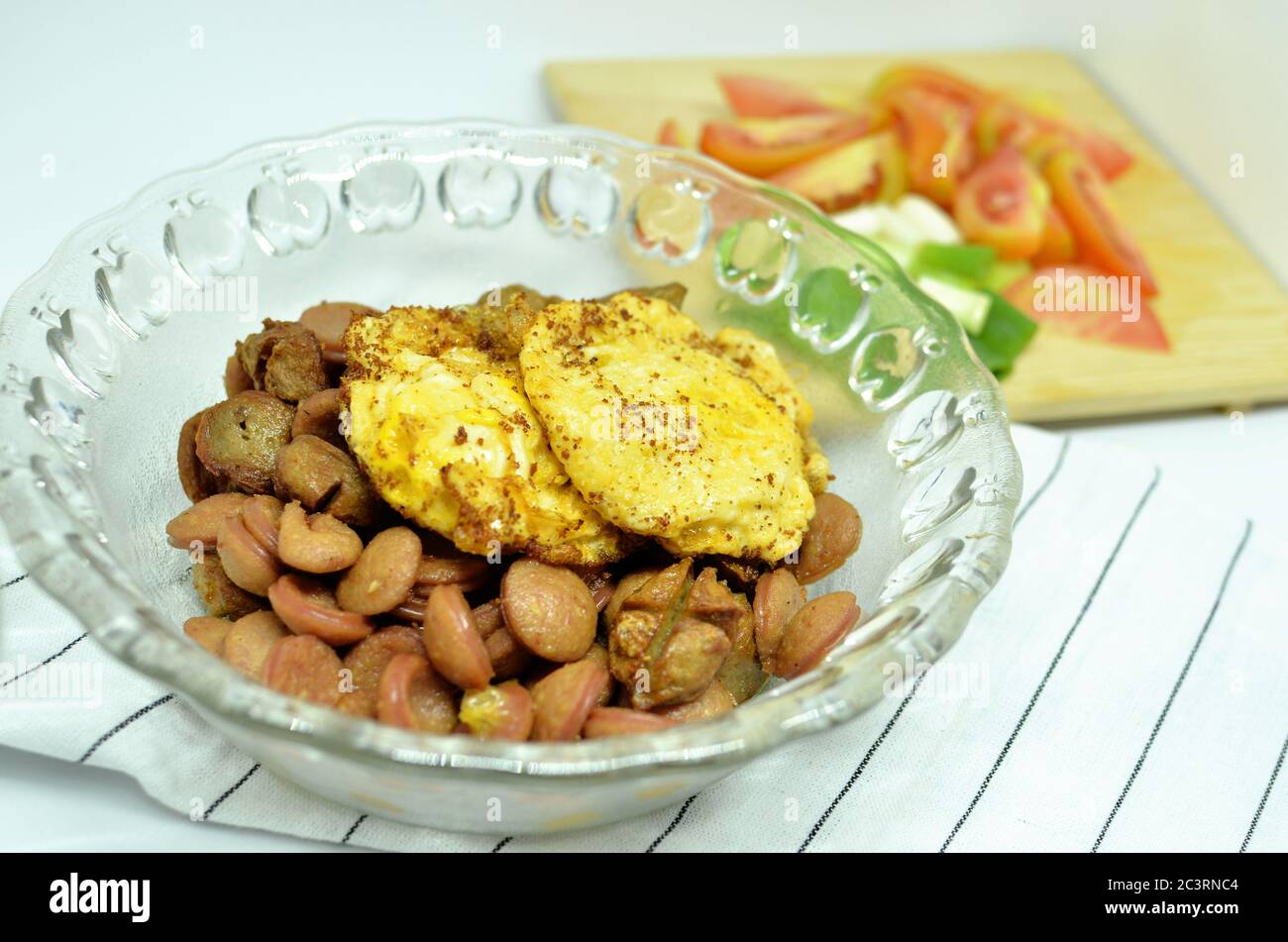 Fried egg, sausage and tomato Stock Photo Alamy