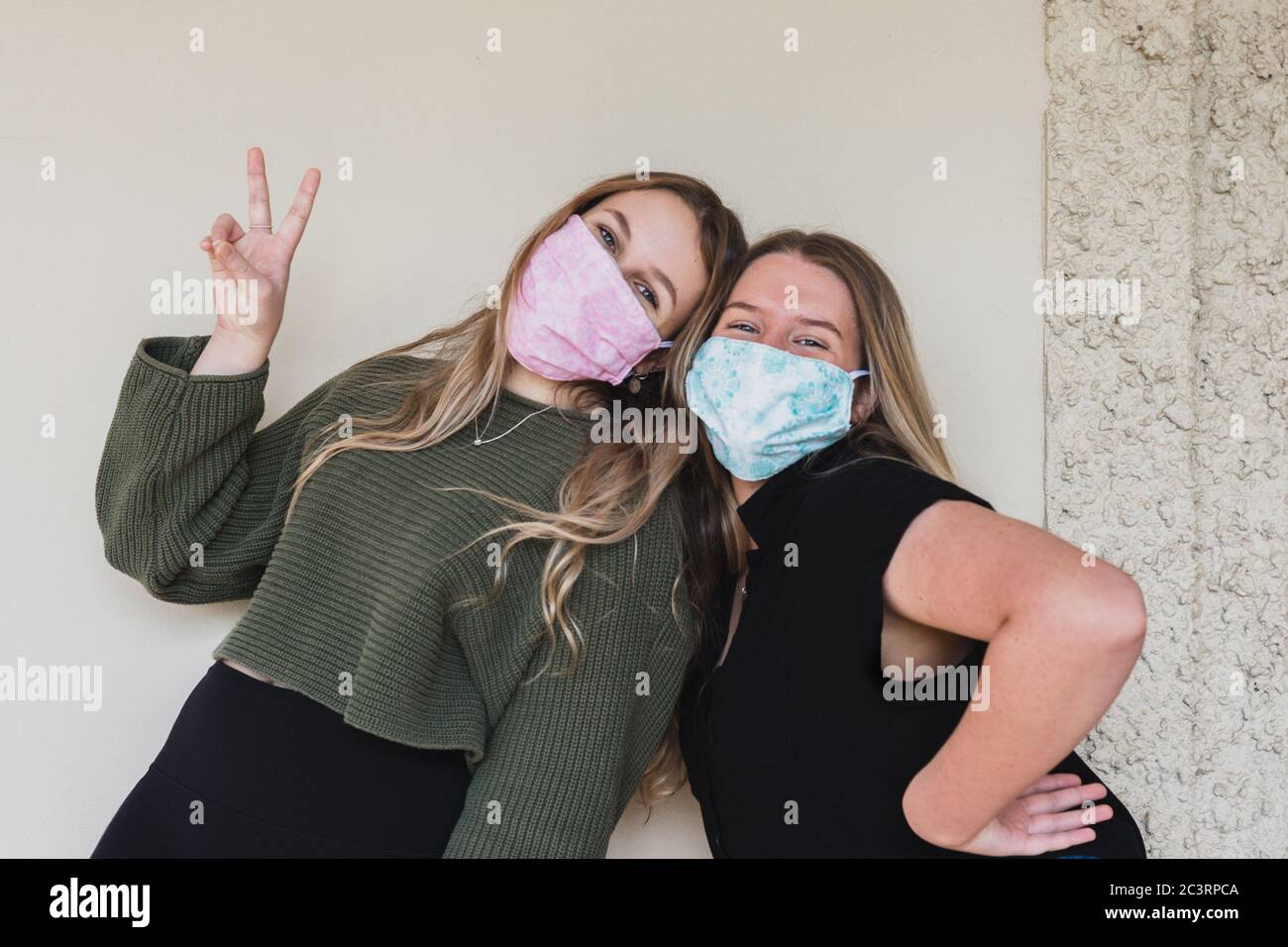 Young women facemasks hi-res stock photography and images - Alamy