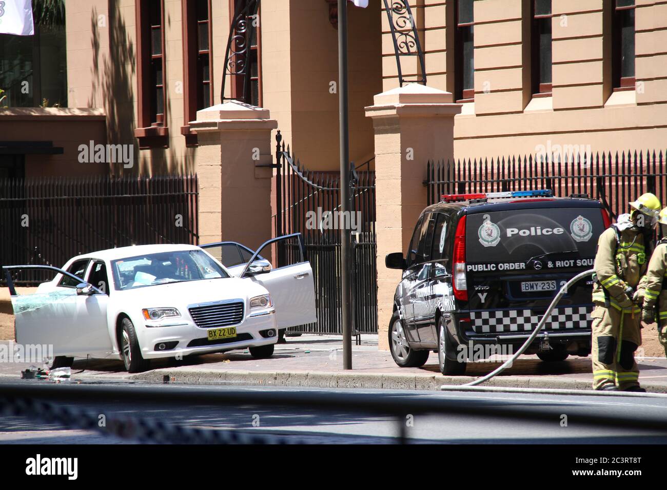 The windows of the white car are smashed after tactical operations and ...