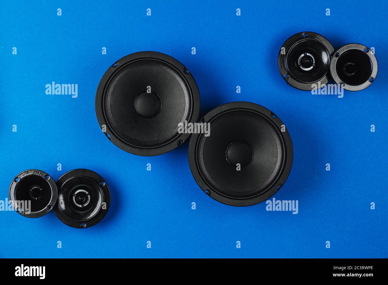 Car audio, car speakers, black subwoofer on a blue background Stock Photo -  Alamy