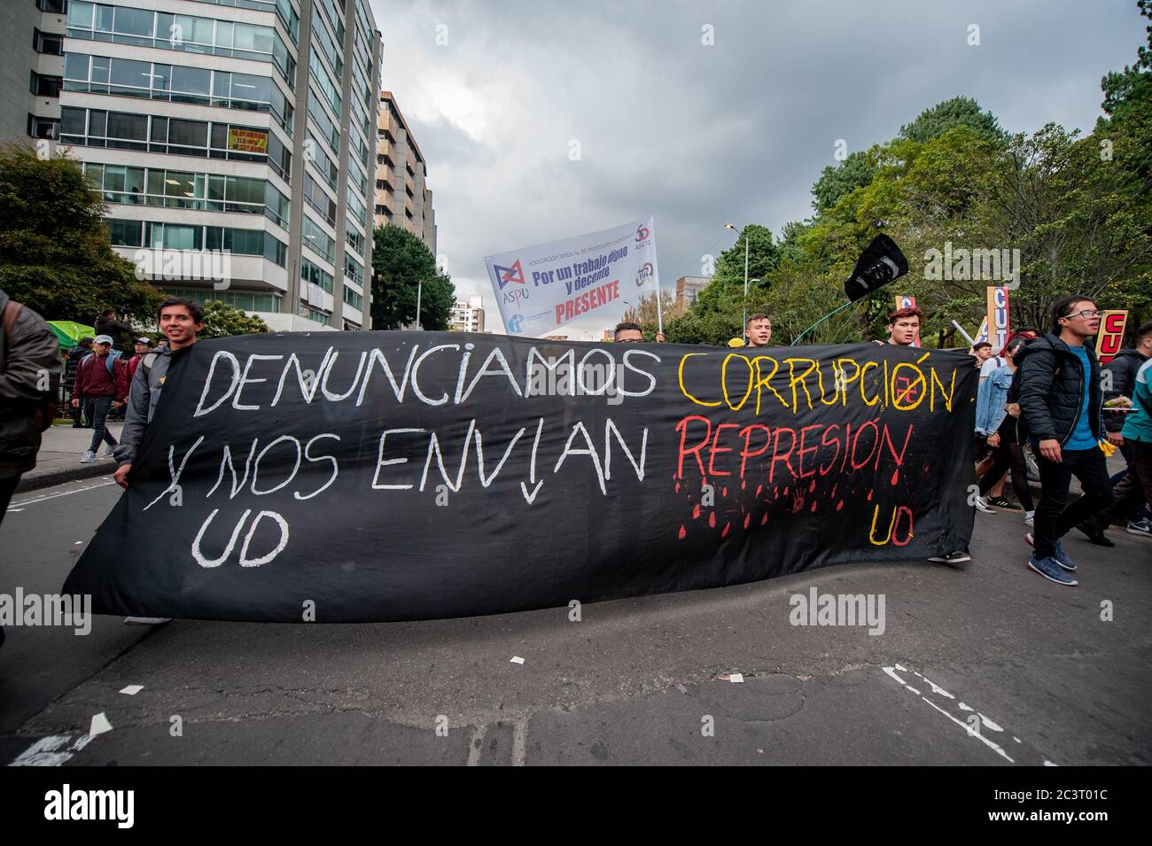Demonstrations all across Bogota, take place as a protest against police brutality used by the riot squad of Colombia's police, ESMAD, with banners an Stock Photo