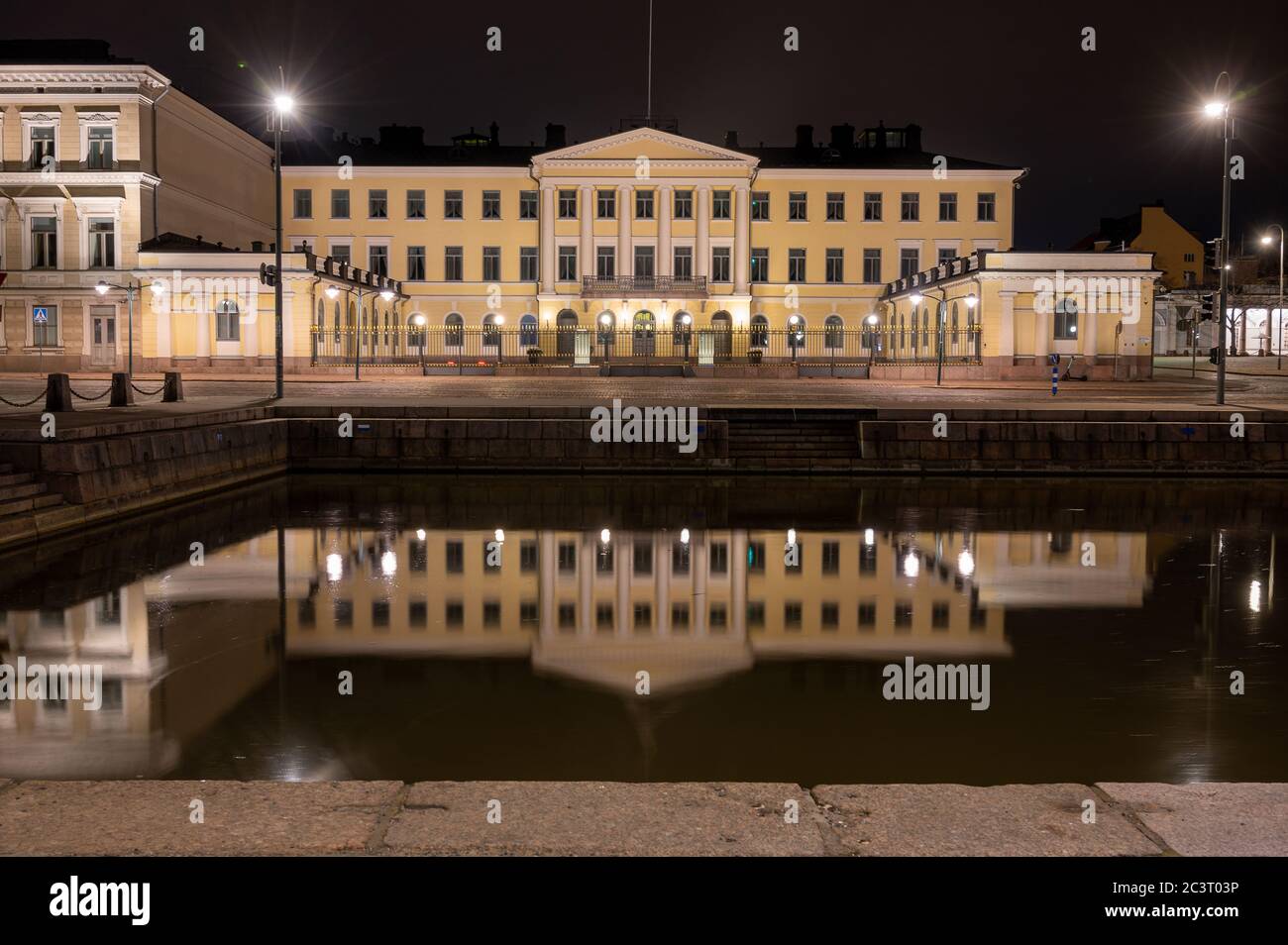 Helsinki / Finland - April 24, 2020: The presidential palace of finnish president located in downtown Helsinki photographed during nighttime. Stock Photo