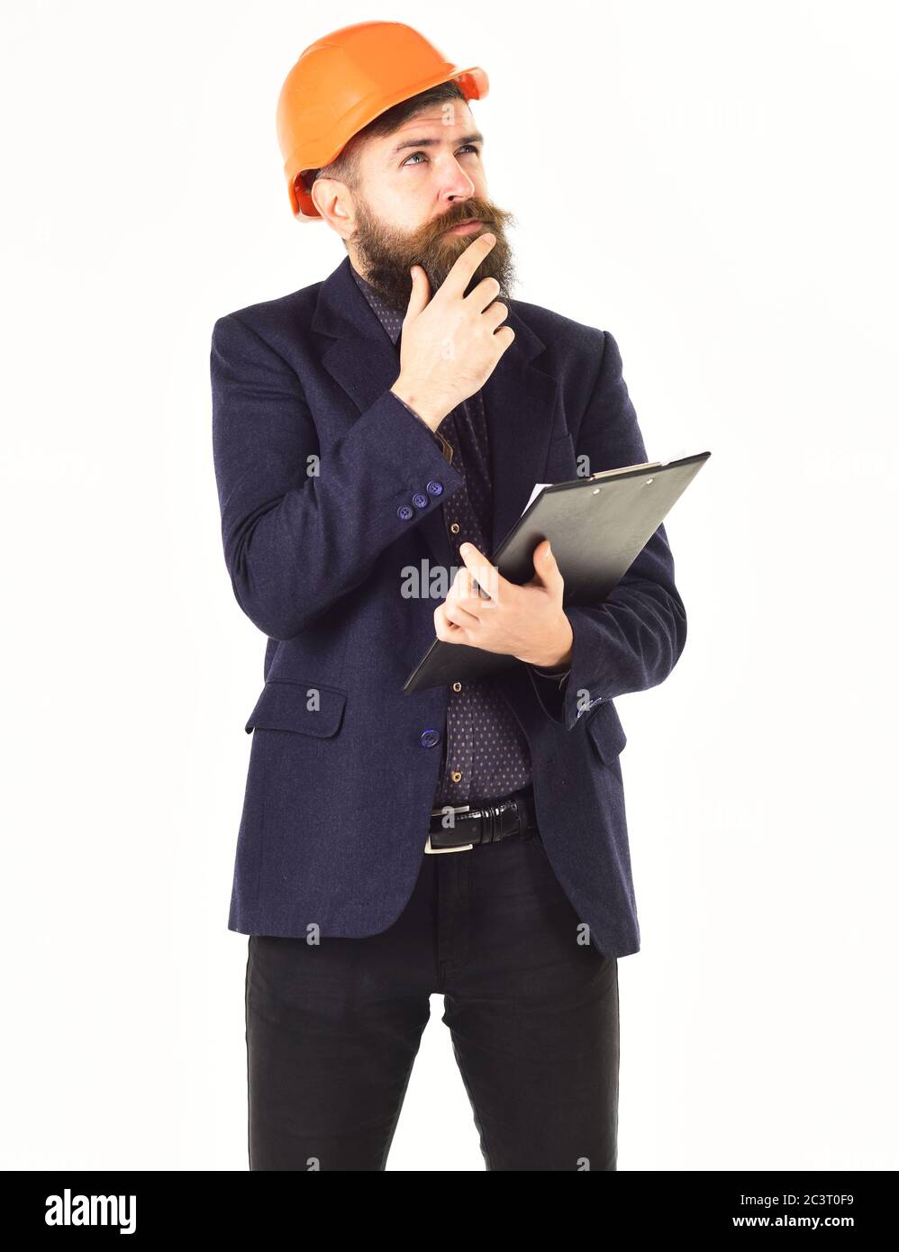 Controller wears construction helmet. Building controller with thoughtful face Stock Photo Alamy