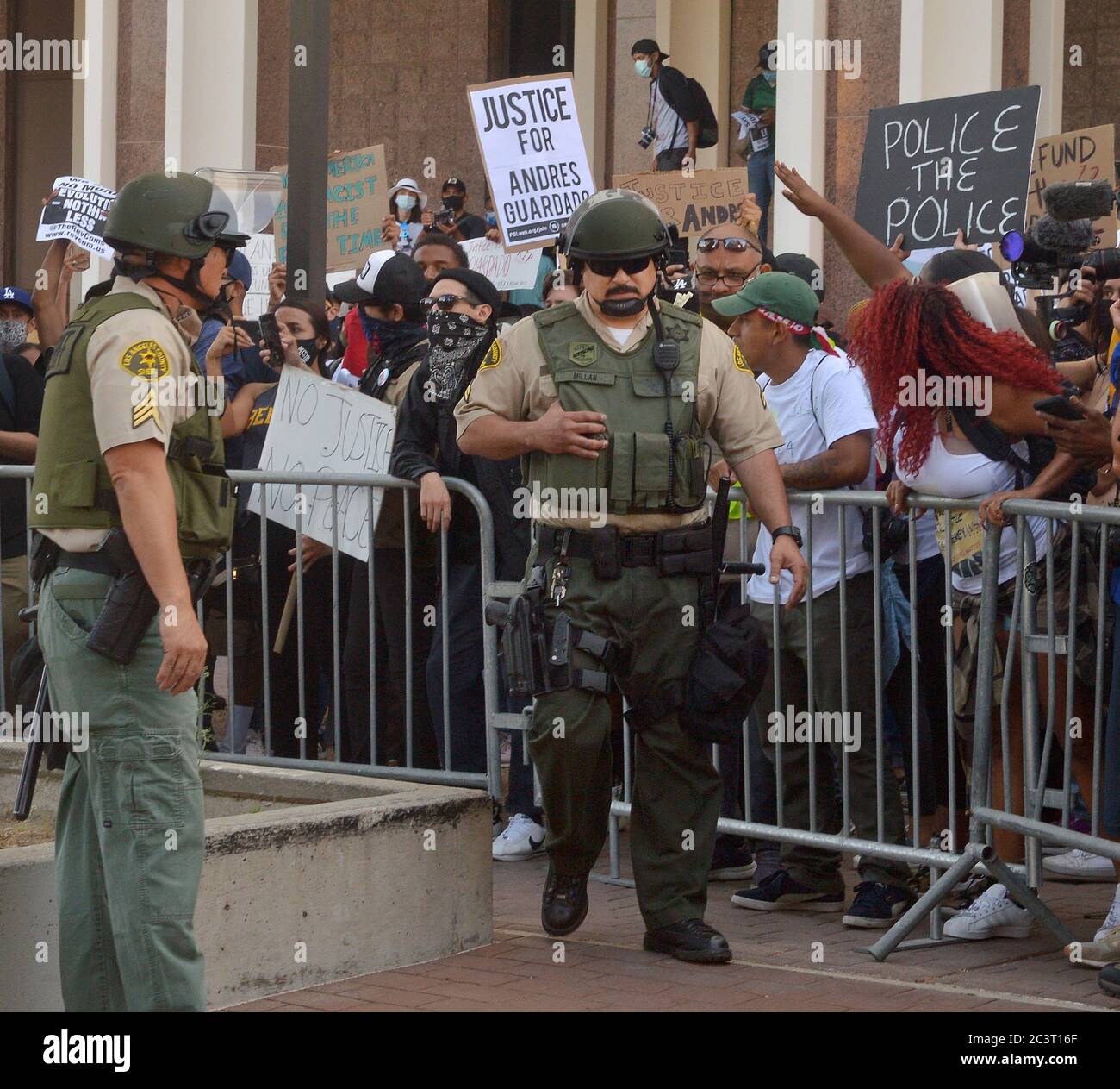 Compton, United States. 22nd June, 2020. Protesters and sheriff's