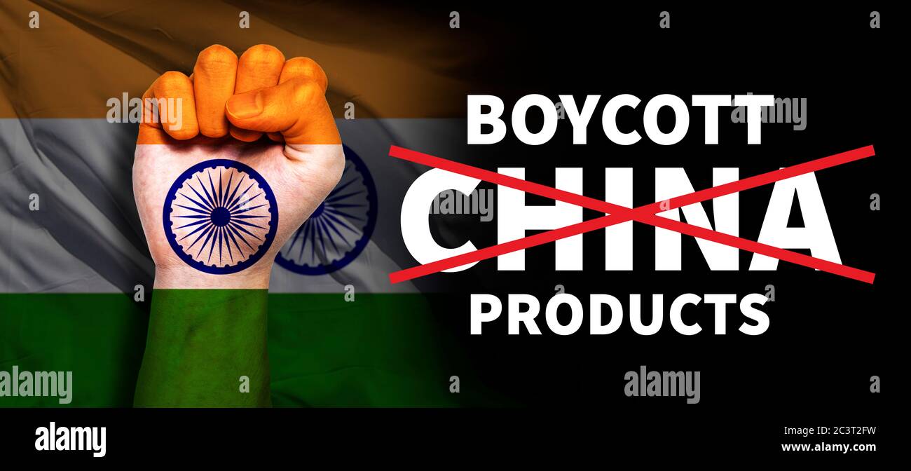 Conflict and tension between India and China, boycott China products, male fists with India flag painted on skin - fight and conflict between two coun Stock Photo