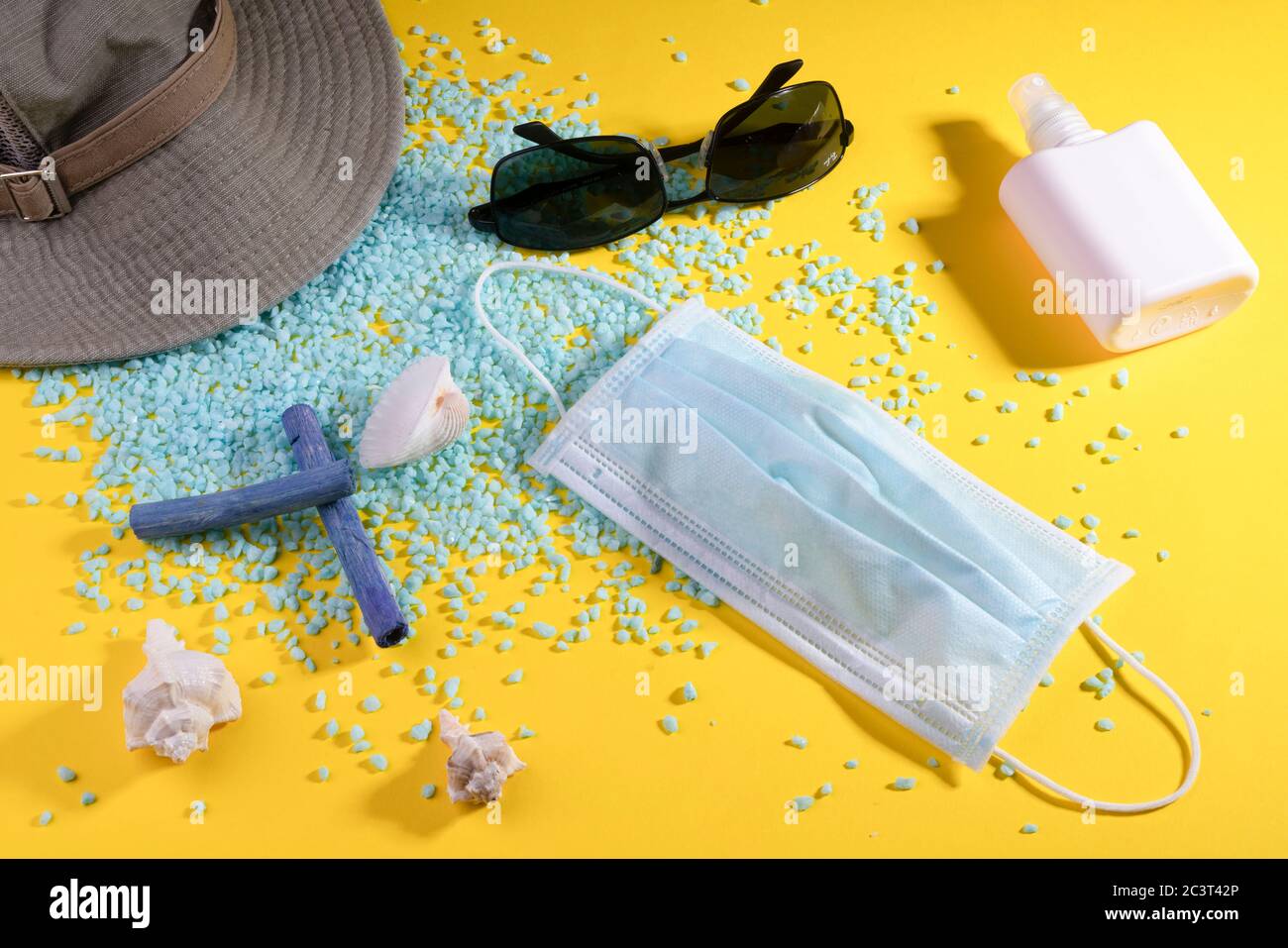 Objects representing the summer of 2020 in a pandemic period from Covid-19 Stock Photo