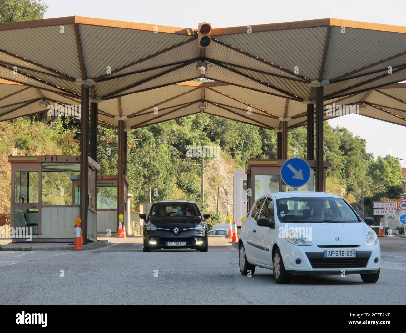 (200622) -- LA JONQUERA, June 22, 2020 (Xinhua) -- Vehicles cross the border between Spain and France from La Jonquera, Spain, on June 21, 2020  The State of Alarm which was imposed on Spain on March 14 to halt the spread of the coronavirus expired at midnight between Saturday and Sunday, allowing the country to progress into what Spanish Prime Minister Pedro Sanchez called the 'new normality.'   Spaniards are now able to move freely around the country for the first time since March 14. Spain has also reopened its borders to travelers from the European Union and Schengen travel regions, and th Stock Photo