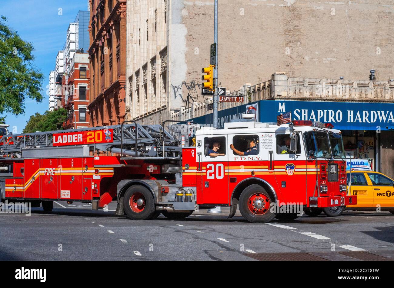 A long fire truck from the East Village, New York, USA.  East Village is probably the social mecca of New York. Unlike Greenwich Village, Village Each Stock Photo