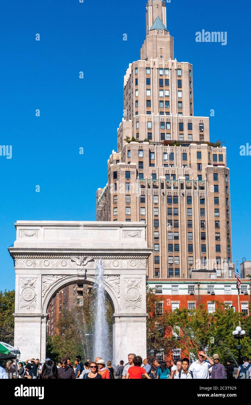 Washington Square Park in Greenwich Village, Manhattan, New York, USA. One of the biggest highlights of the park, is the Stanford White Arch, marble a Stock Photo