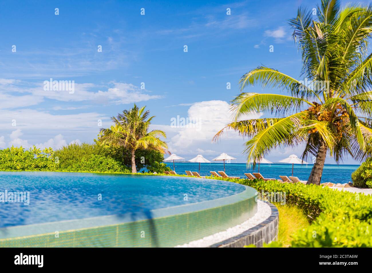 Picture of Private oceanfront pool with submerged loungers in a luxury resort in ...