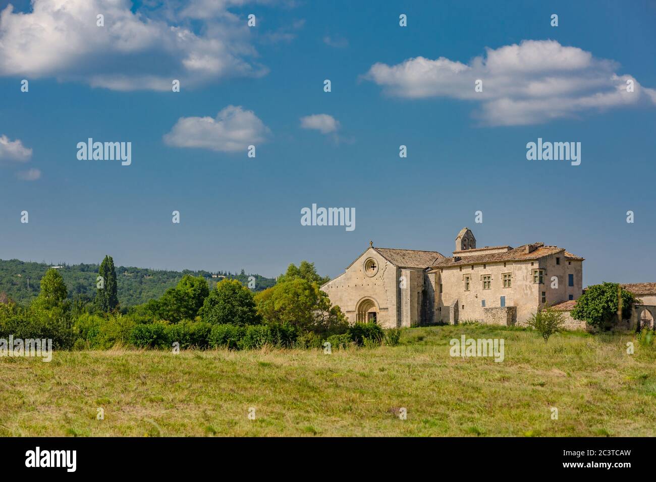 Salagon - tourist destination, Provence, France, famous for herbal, medicinal plants. Traditional stony church tower in the countryside of Provence Stock Photo