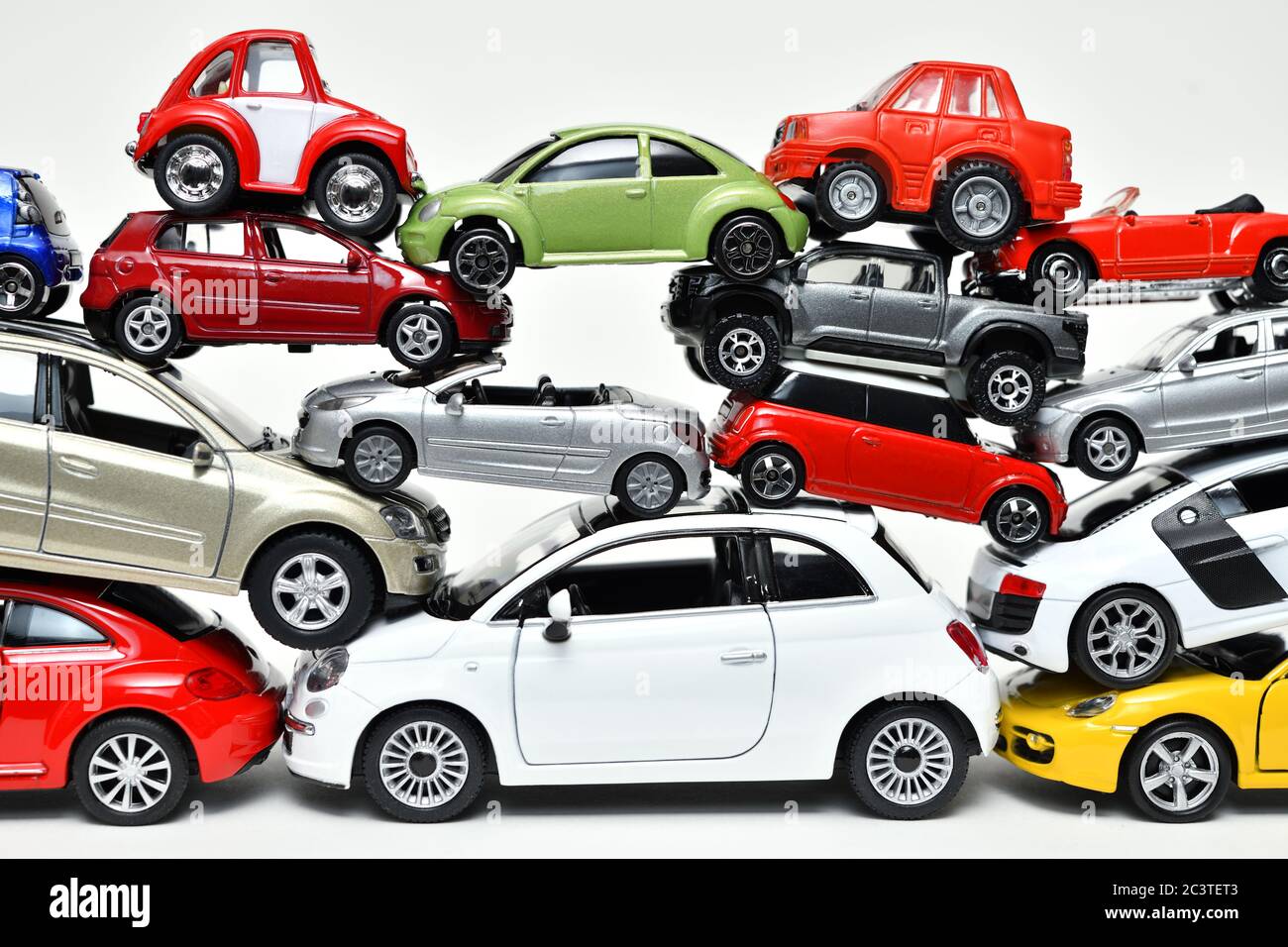 Stacked toy cars, Symbolfoto auto premium, Gestapelte Spielzeugautos, Symbolfoto Autoprämie Stock Photo