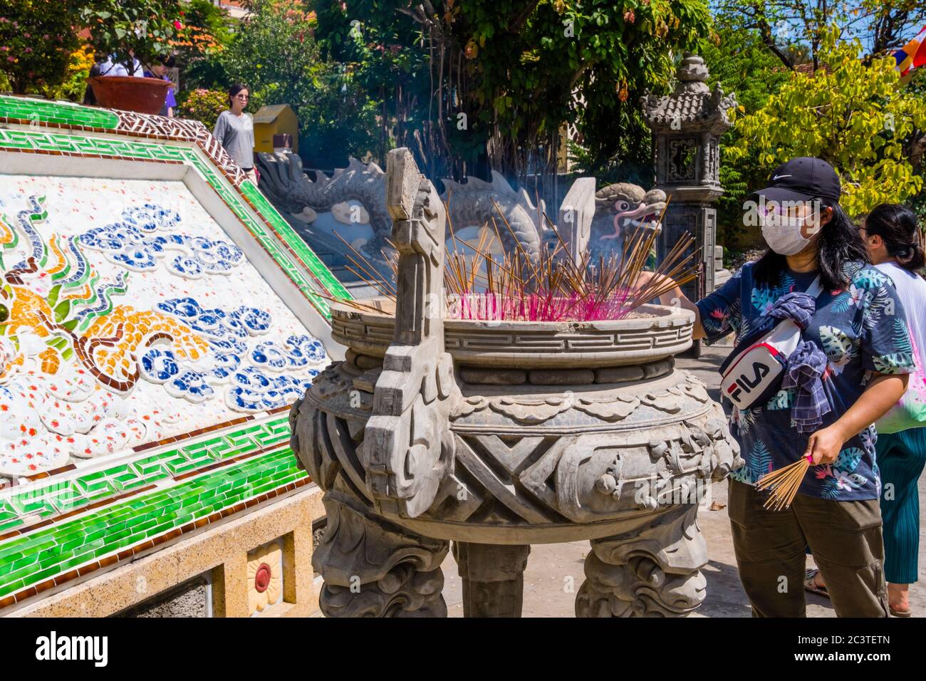 Offering, in the form of burning incense, Choa Long Son, Long Son pagoda, Nha Trang, Vietnam, Asia Stock Photo