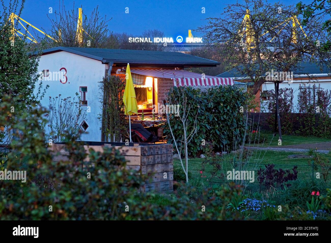 allotment garden in front of BVB Stadion Signal Iduna Park in the evening, Germany, North Rhine-Westphalia, Ruhr Area, Dortmund Stock Photo