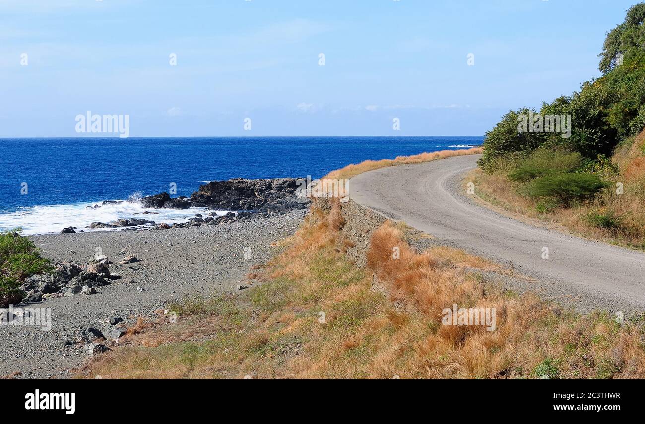 The metalled road running along the wild coast of eastern Cuba Stock Photo