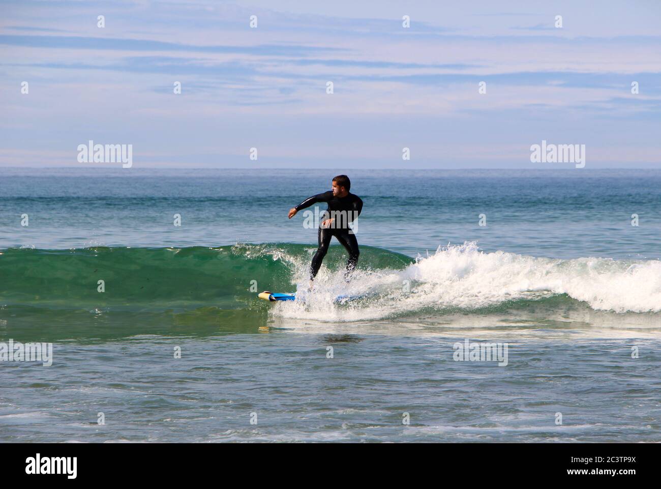 Surfer in the sea wearing a wetsuit hi-res stock photography and images ...